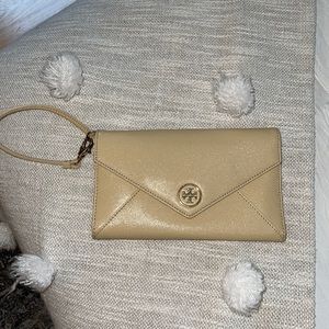 Neutral colored Tory Burch wristlet
